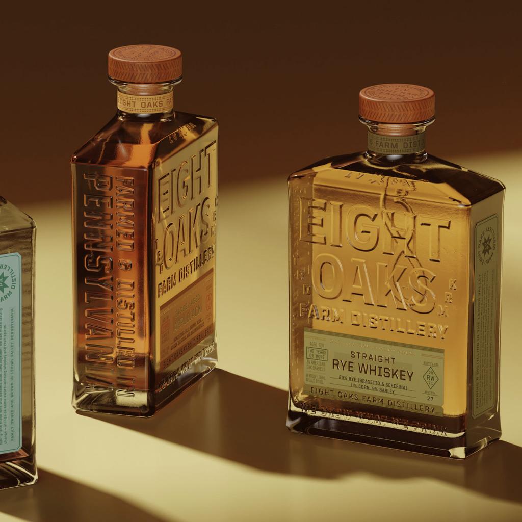 Custom glass bottle with embossed logo and decorative finish