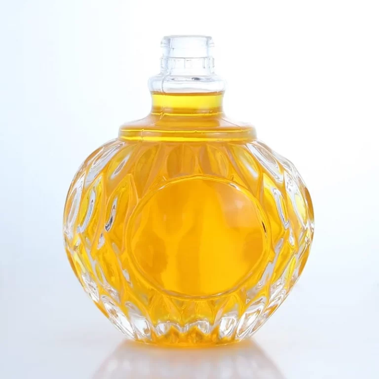 197- 200ml embossed mini round glass bottle with guala cap