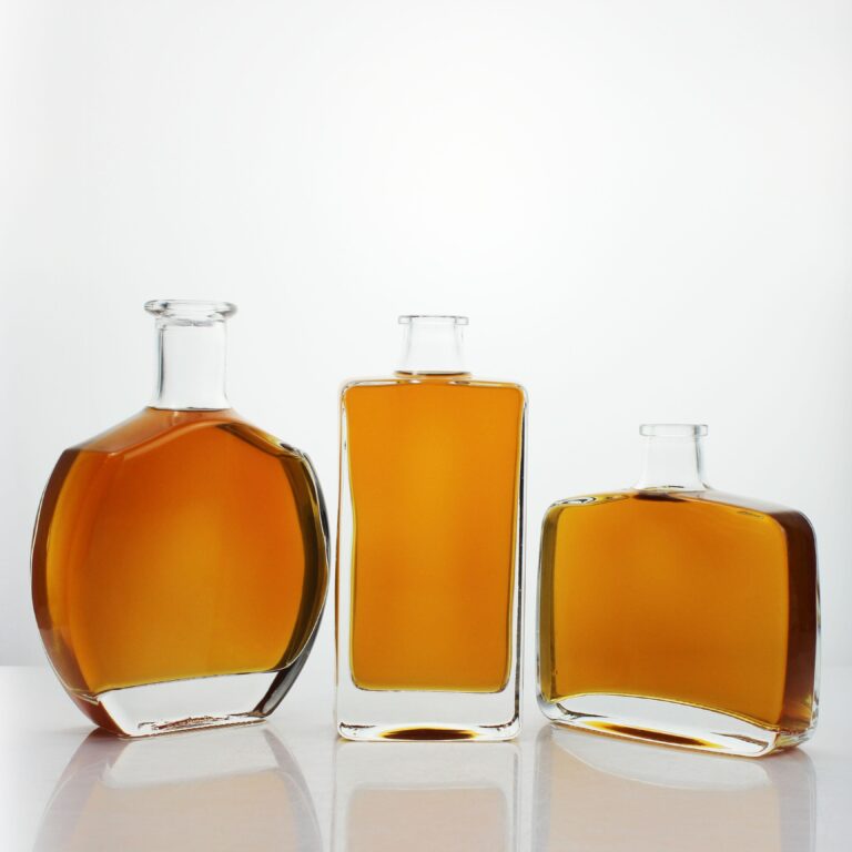 Custom glass bottle designs for spirits and beverage packaging